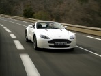 aston-martin-v8-vantage-roadster-2009-white-driving-view.jpg