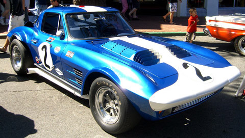 1963 Chevrolet Corvette Grand Sport driven by Bob Bondurant in a race