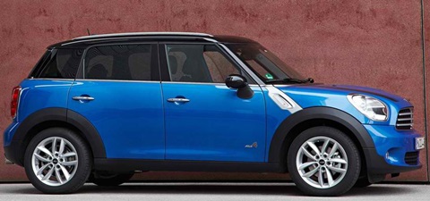 2013-Mini-Countryman-Cooper-ALL4-against-a-red-wall B