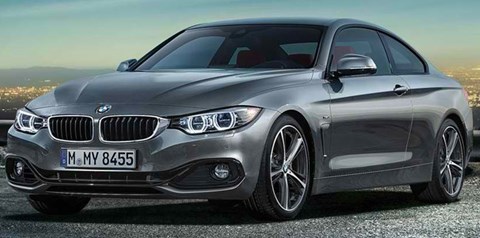 2014-BMW-4-Series-Coupe-above-city-lights A